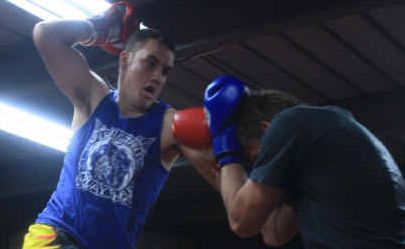 Power-packed Elliott Brigginshaw launches an aerial attack on training partner Tom Robinson. Power-packed Elliott Brigginshaw launches an aerial attack on training partner Tom Robinson.